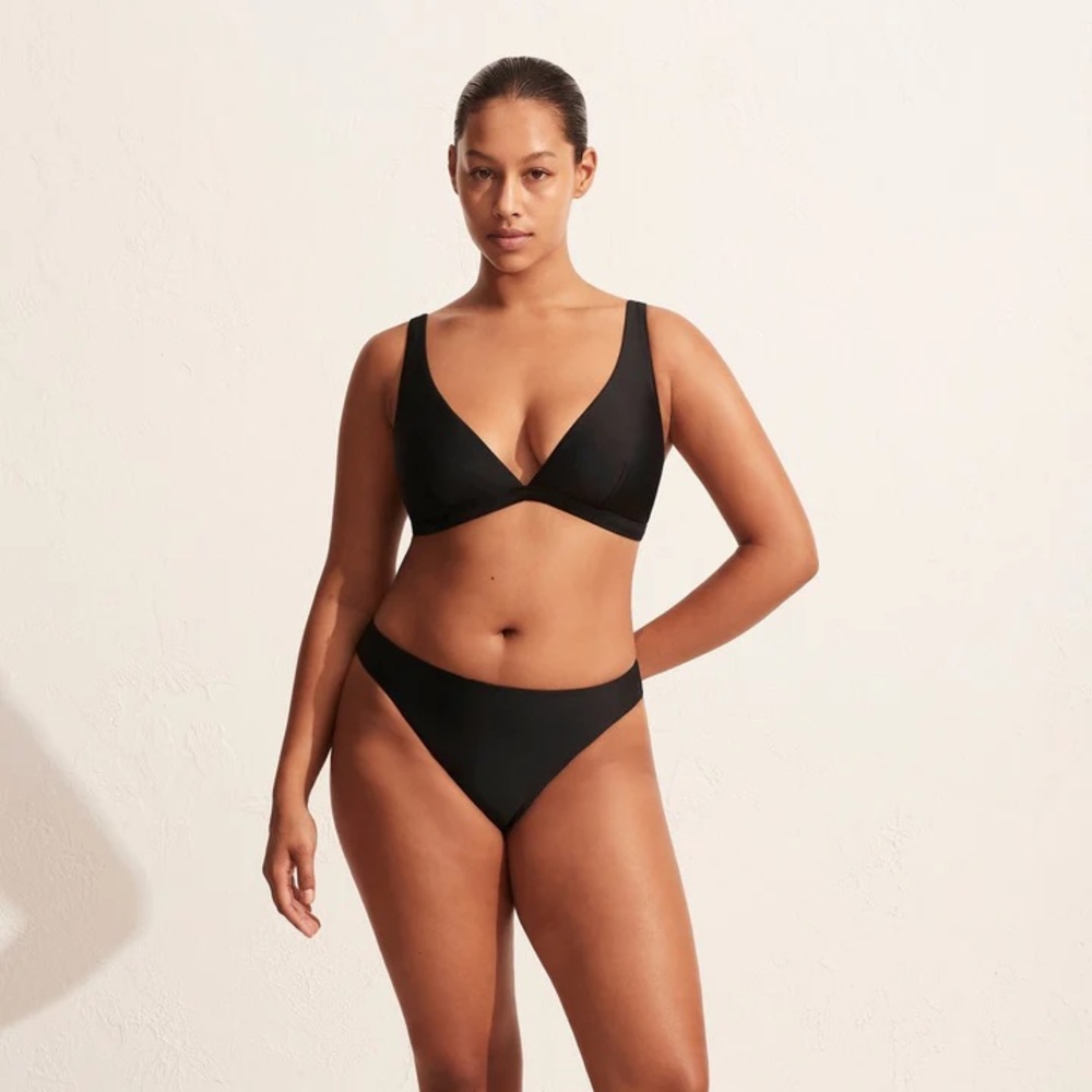 Matteau black bikini top with adjustable straps. New with tags, never worn.